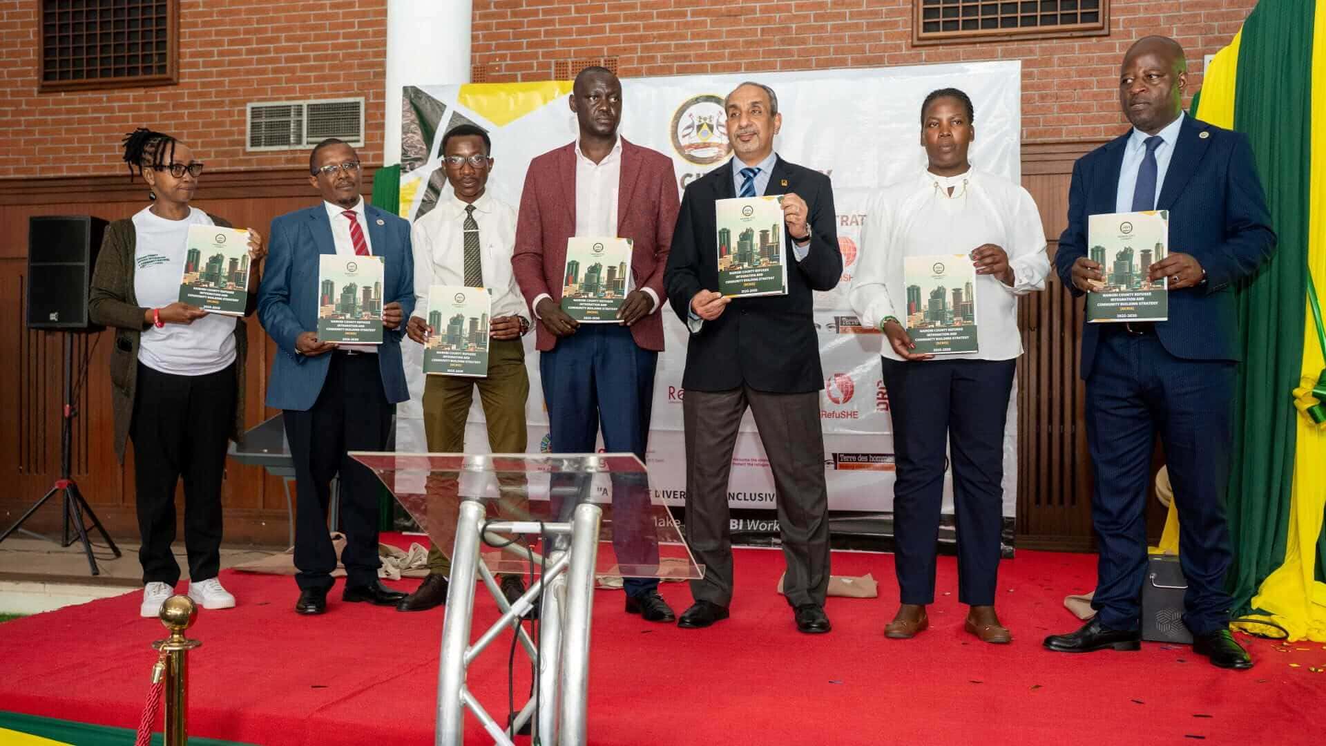 Mohammed El-Montassir, IRC Kenya Country Director, (2nd from right) joins Nairobi City County and partners to launch the Nairobi County Refugee Integration Strategy