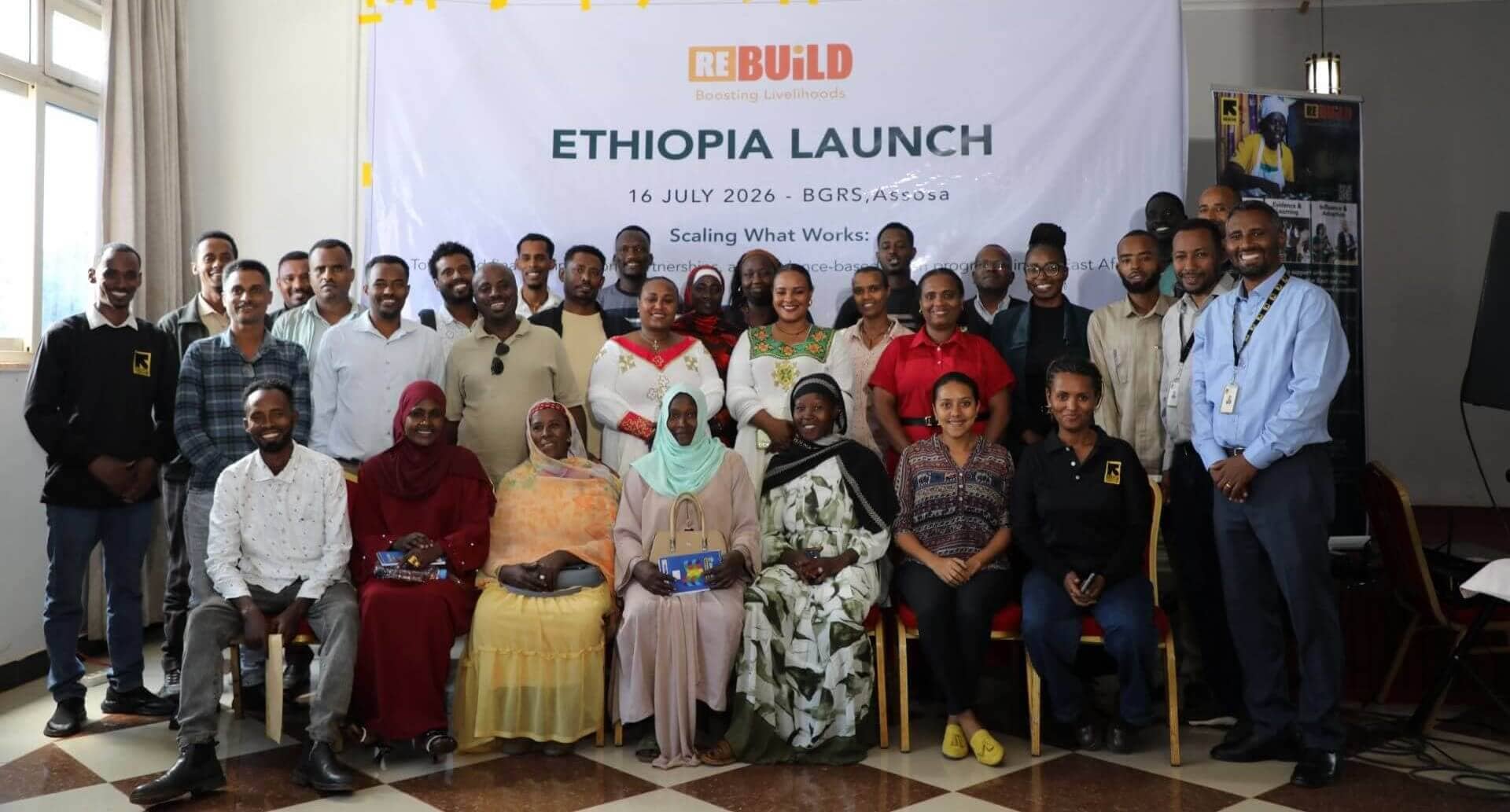 A group photo of IRC staff, Government stakeholders, refugee and host community clients at the launch of the ReBUiLD in Ethiopia