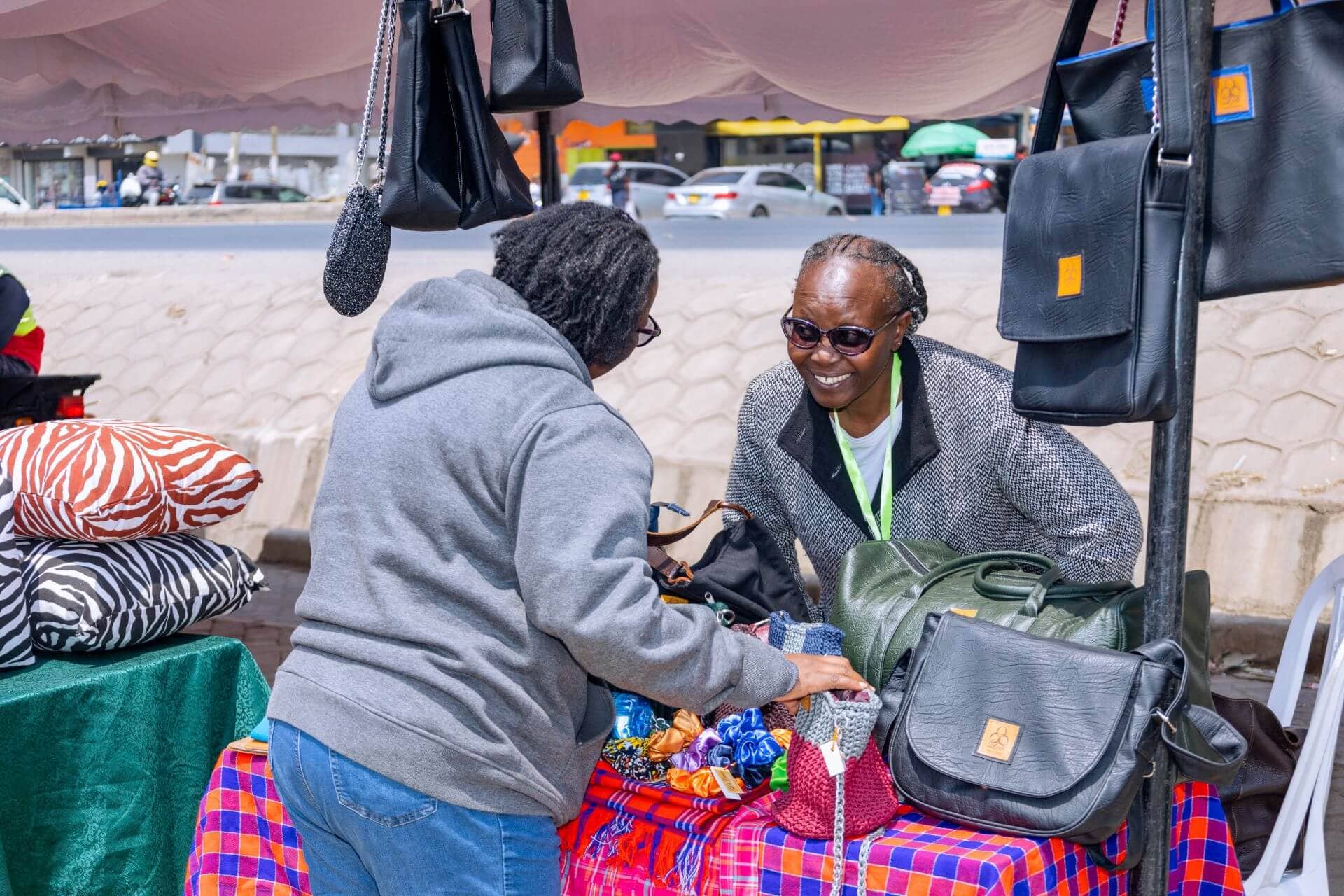 Kibra, Nairobi, Kenya. Entrepreneurs from refugee and host communities showcase and market their products during a community trade fair designed to promote business growth, networking, and economic inclusion.