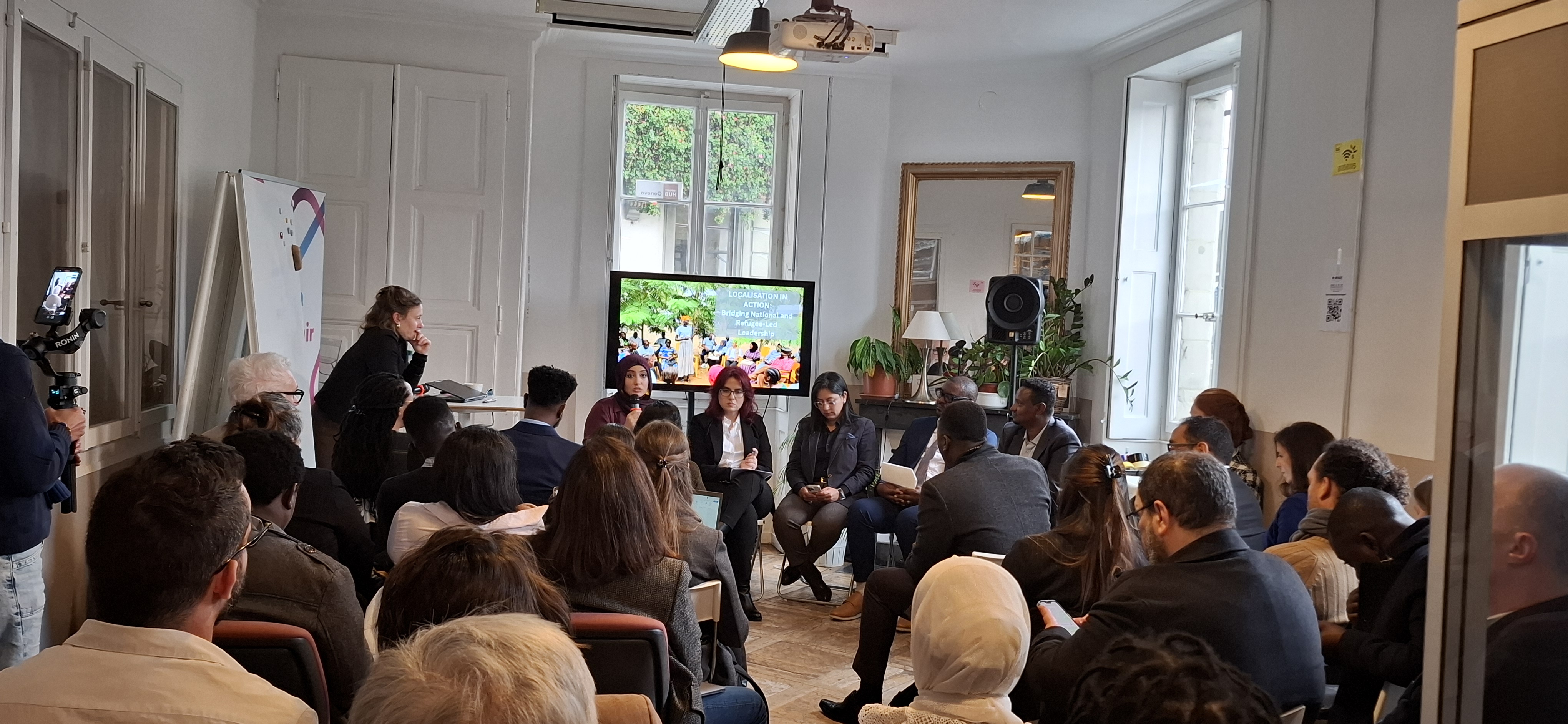 Plenary session at the Impact Lab on Localization in action and bridging leadership.