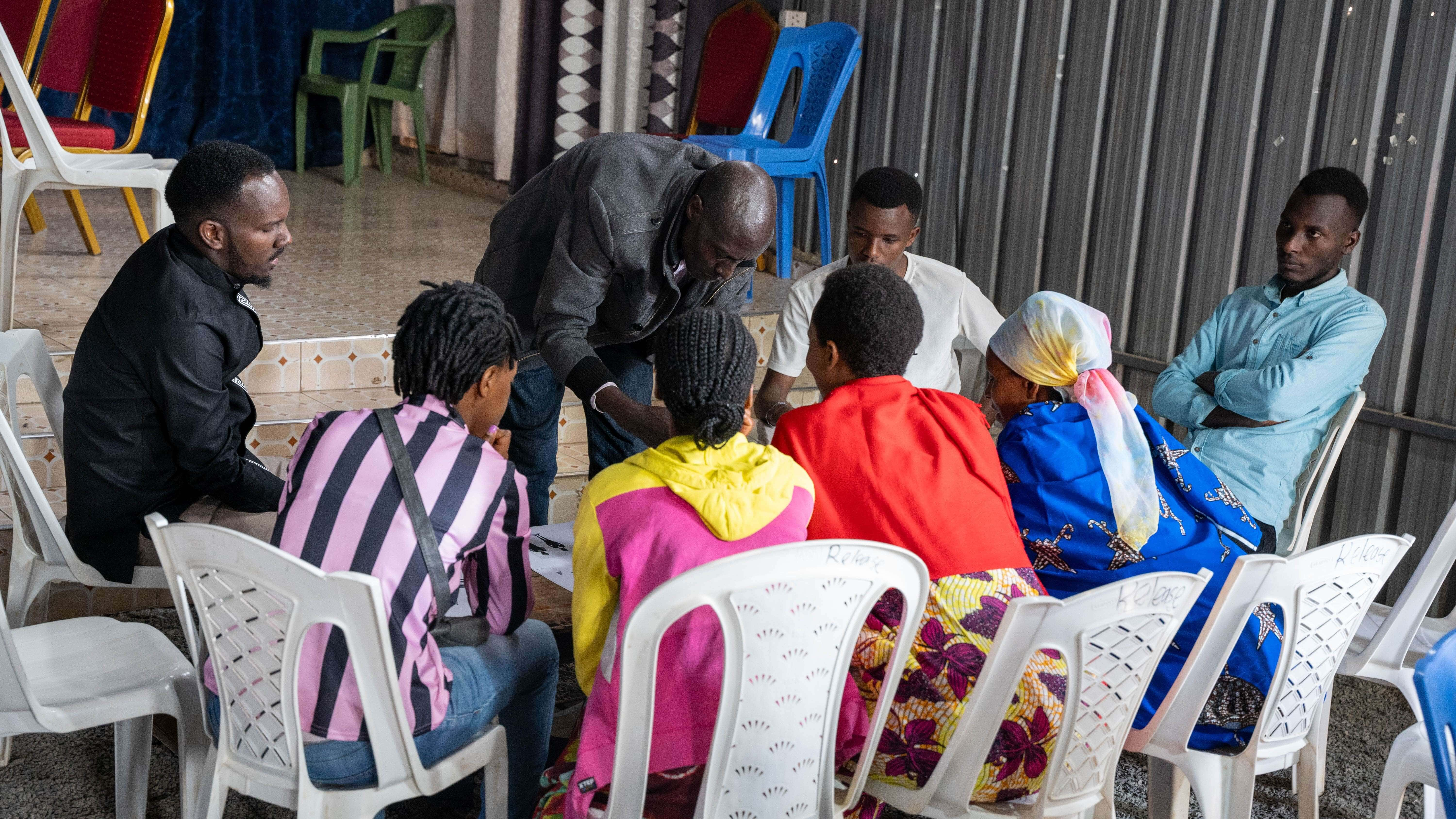 A group of IRC clients comprising of Kenyans and refugees during and Economic and Social Empowerment (EA$E) training held in October 2023 in Rongai, Nairobi, Kenya