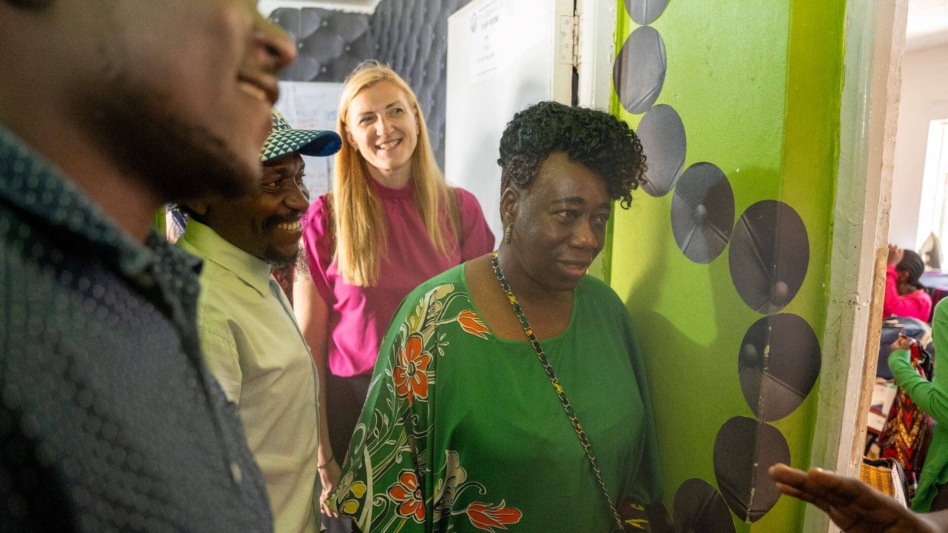 Dr. Lola Banjoko (far right), IRC UK Trustee Chair, at Ubuntu Youth Organization offices in Nairobi