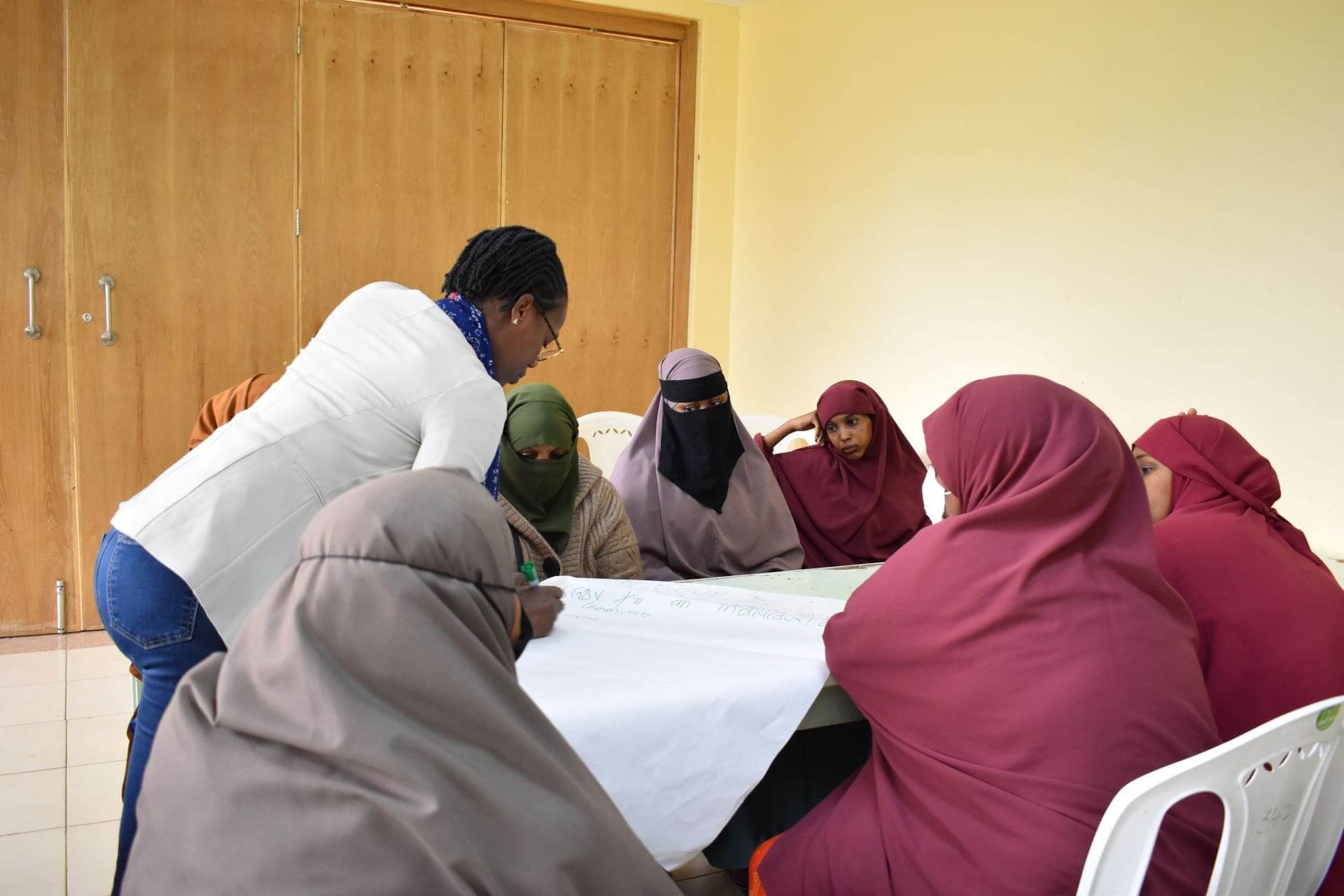 IRC’s Caroline Boke interacts with clients during the SGBV session in Eastleigh