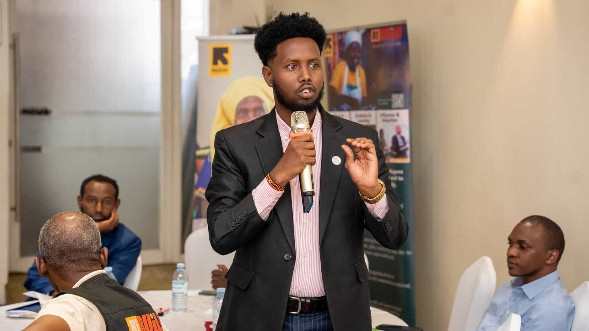 Ismail Hussein Ismail, Team Leader, Aider Refugee Initiative sharing key challenges faced by refugees in accessing documentation