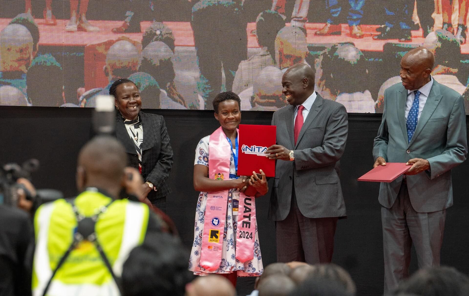 One of the RPL graduates receiving her certificate from the Deputy President of Kenya, Rigathi Gachagua