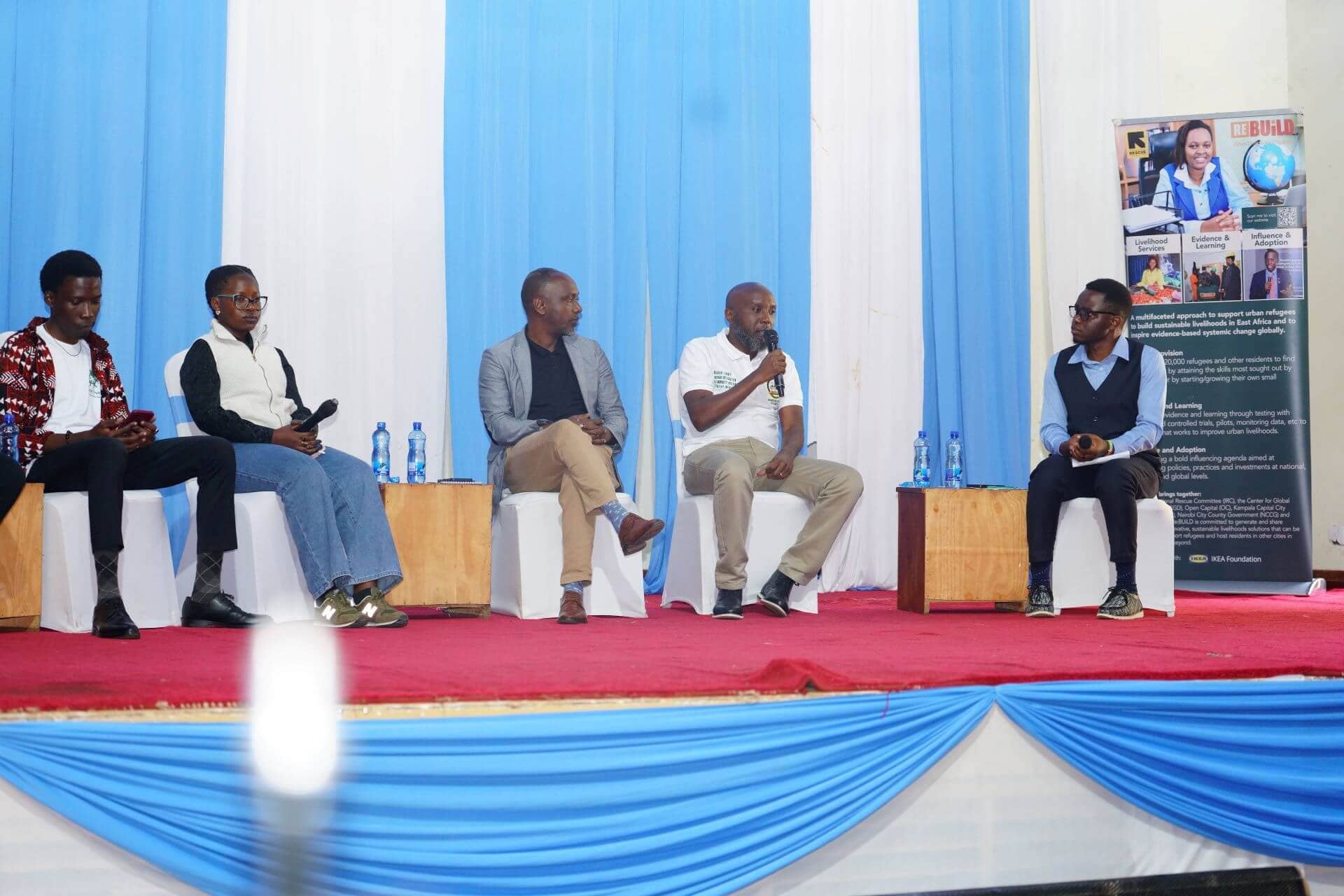 Panel with Nairobi City County, Pamoja Trust, Kituo Cha Sheria, refugees, and Gender Dept on refugee inclusion at WRD event
