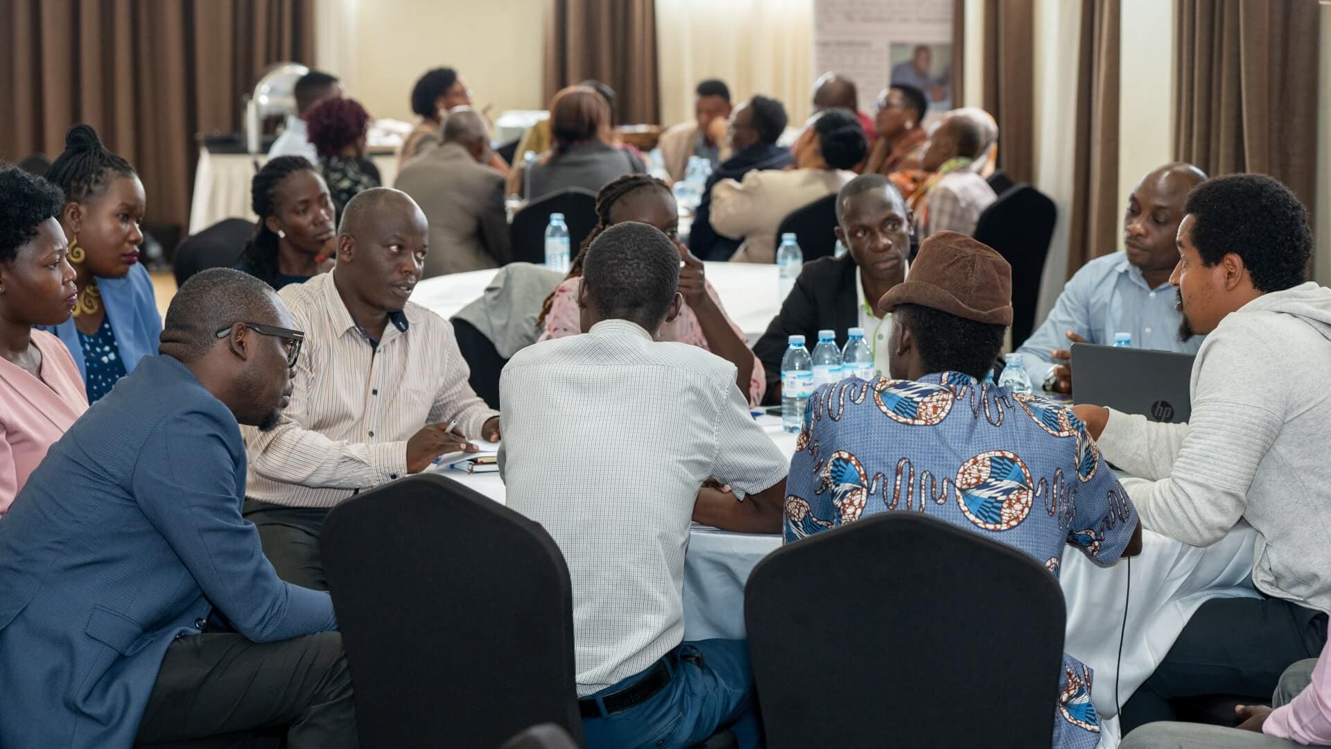 Participants discuss action points during breakout session at the KCCA roundtable engagement