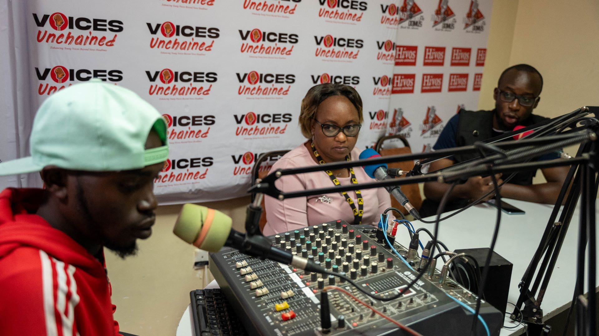 Radio Domus FM presenter and IRC staff during a session to announce mass registration of clients for Re:BUiLD's Wave 2 RCT