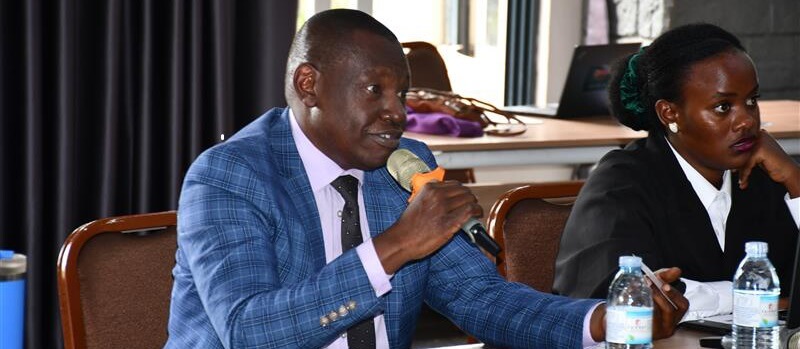  UGAFODE CEO Shafi Nambobi speaking during  a meeting convened by Re:BUiLD that  brought together stakeholders in the business environment in Kampala. He said his institution had to adjust internal policies to serve refugees