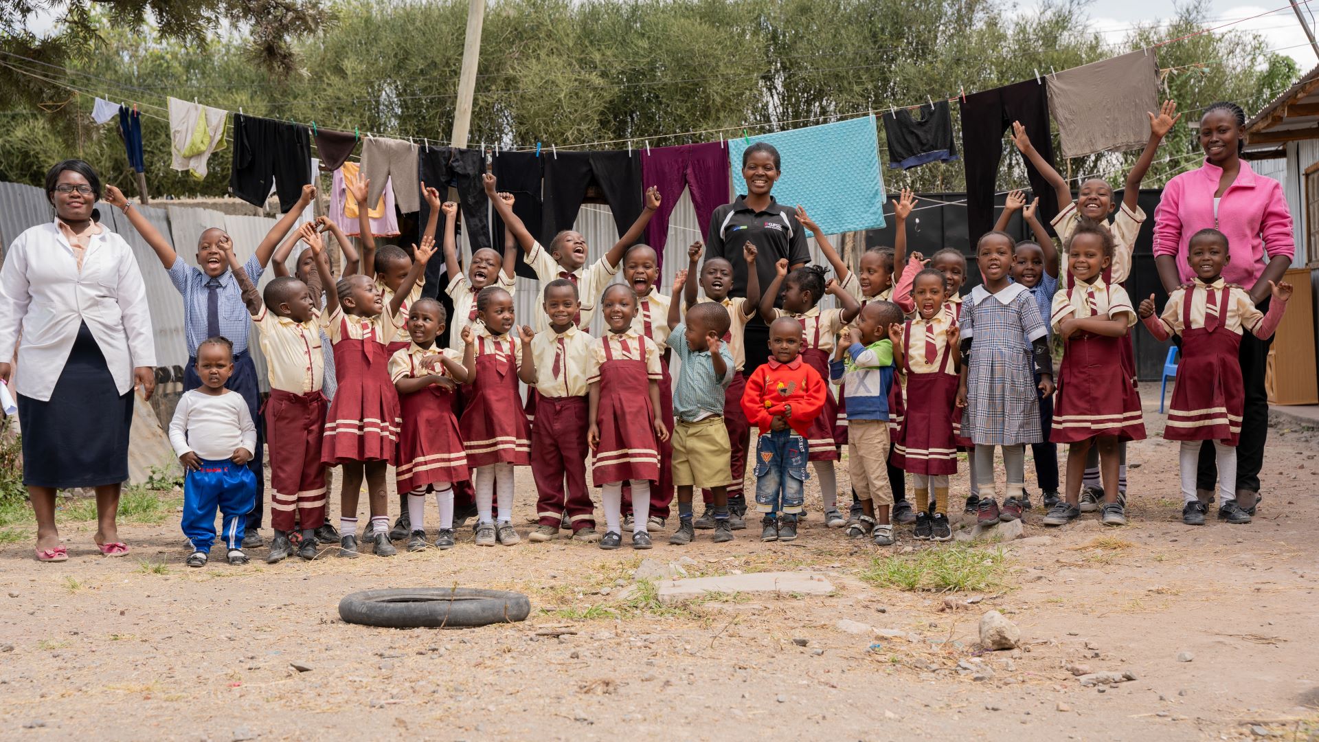 Winfred posing for a photo with her students in Kitengela, Nairobi (Photo: Edgar Otieno for IRC)