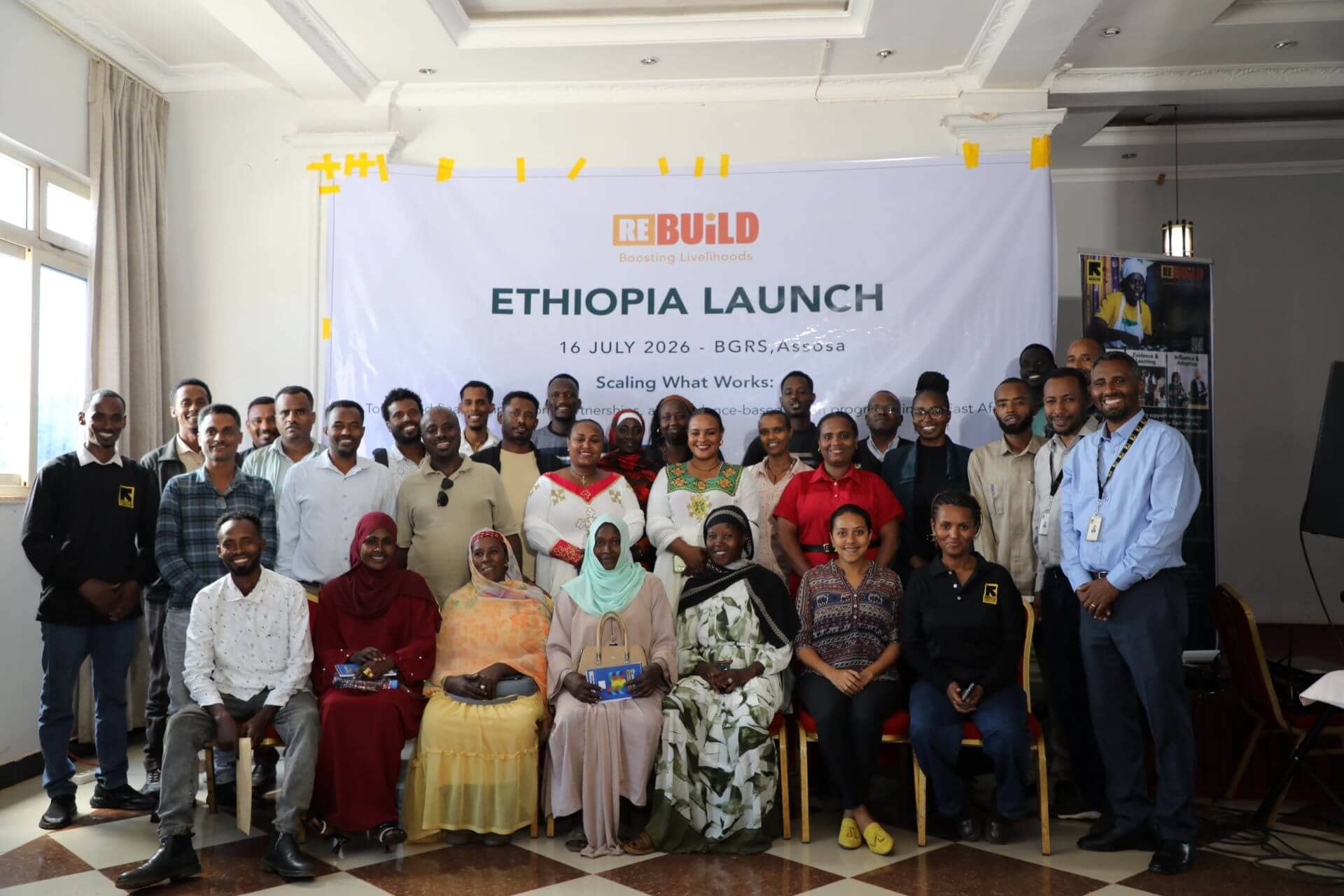 IRC staff, government stakeholders, refugee and host community clients at the Re:BUiLD Ethiopia launch in Assosa